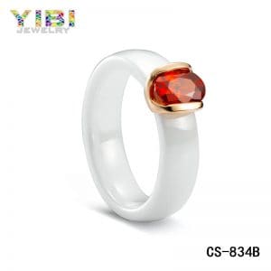 Ceramic engagement rings with red oval cubic zirconia inlaid