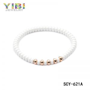White ceramic bead bracelet with rose gold plating