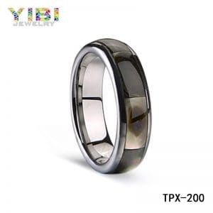 Tungsten carbide engagement rings with shell inlay