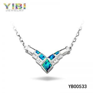 Trendy brass pendant jewelry with blue opal inlay