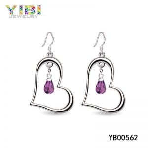 Heart-shaped brass earrings with amethyst stone