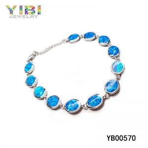 High quality brass bracelet with blue fire opal inlay