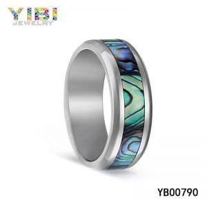 Fine titanium wedding ring with abalone shell inlay