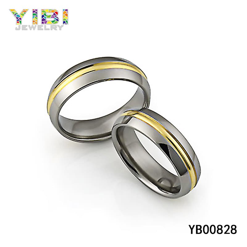 Titanium ring with gold inlay