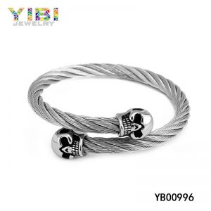 Surgical Stainless Steel Cable Bangle with Antique Skulls